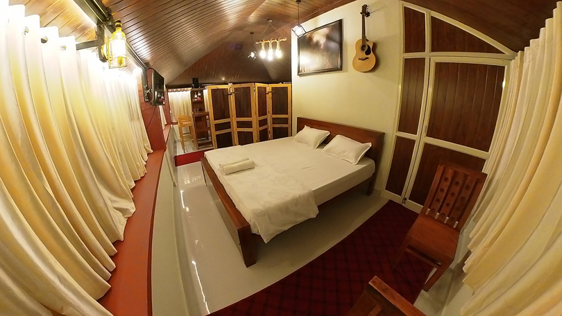 Bedroom interior shown in Makam Holiday Home’s gallery; ask the operator which room category is pictured.