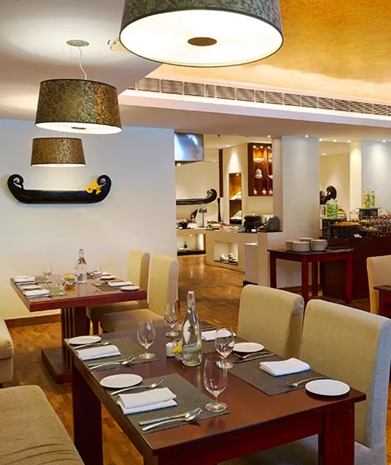 Keraleeyam dining room at The Leela Ashtamudi; confirm current dining service directly.