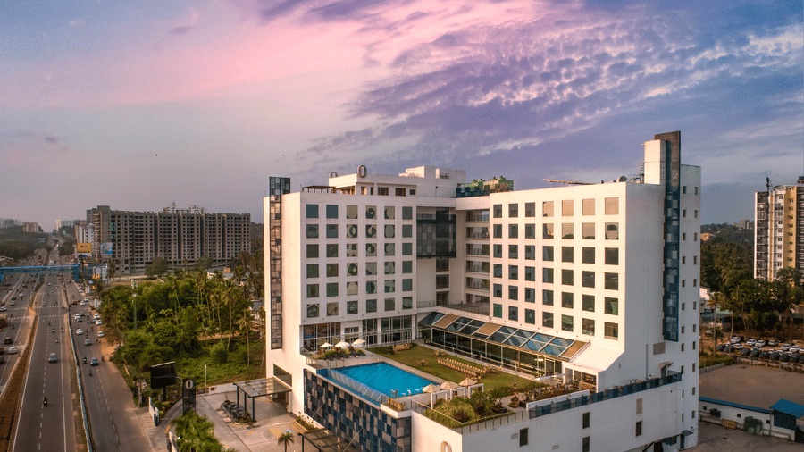 O by Tamara's Trivandrum hotel exterior and pool, as shown in its property gallery.