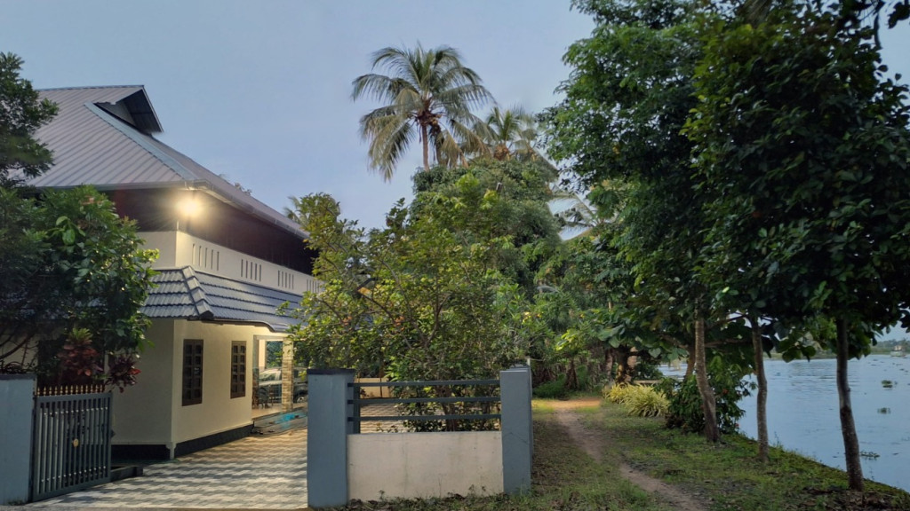 Rivermist Homestay building beside the water at Kandankary, as submitted to Kerala Tourism.