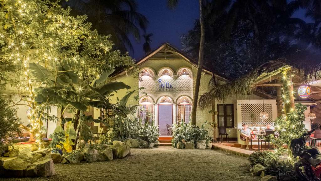 InDa Hotel's North Cliff garden entrance at night in an archived property-submitted image.