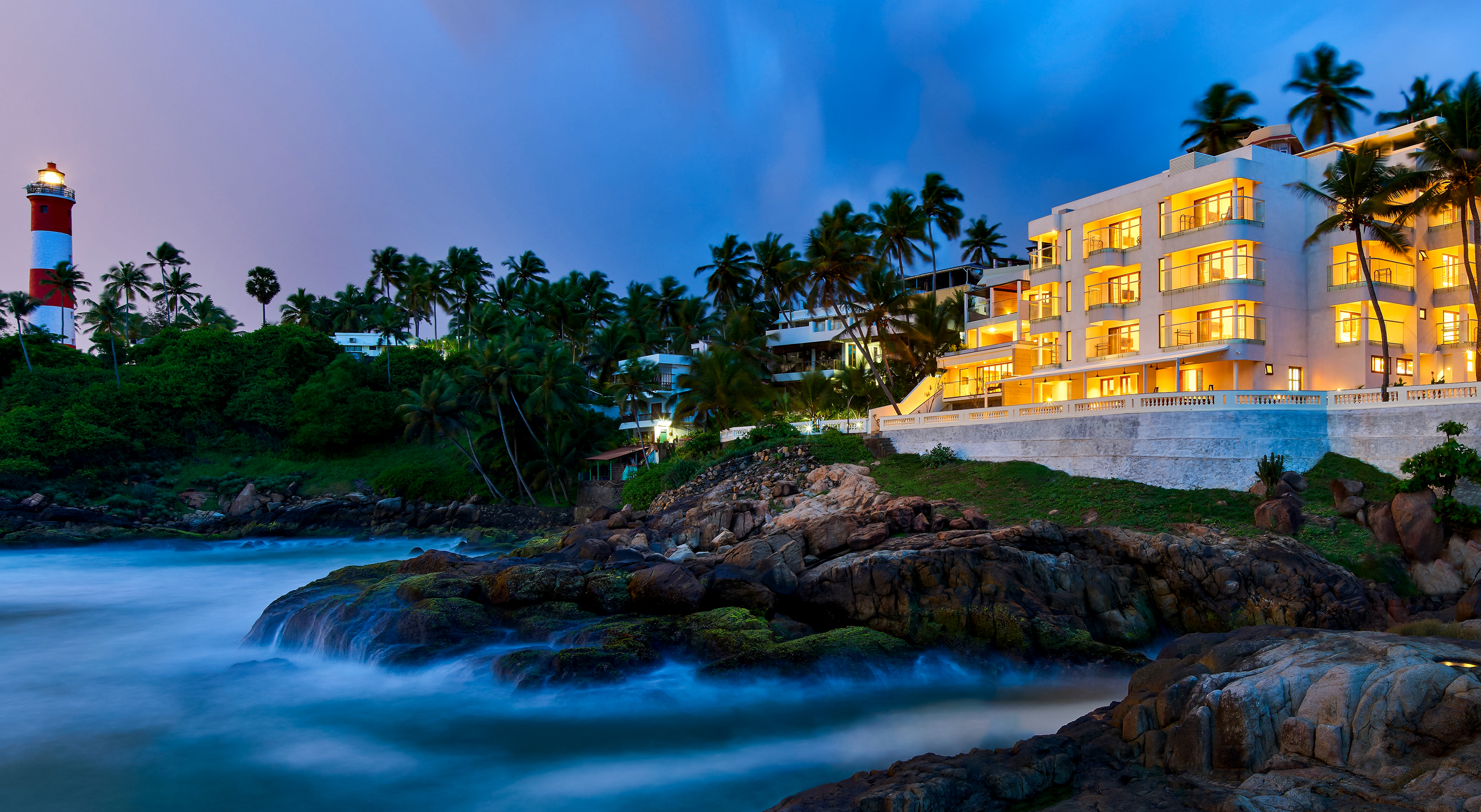 Rockholm building beside Kovalam's lighthouse, published by the operator in July 2026
