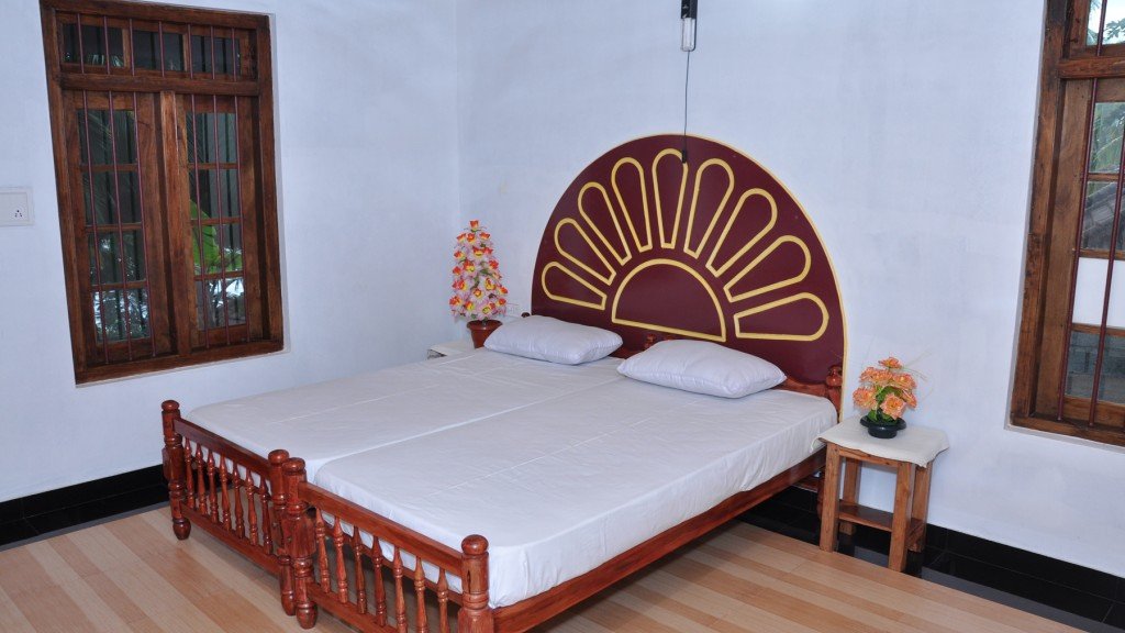 Image submitted for AMRITHA HOUSE on its Kerala Tourism provider page; confirm current appearance and the exact room directly.