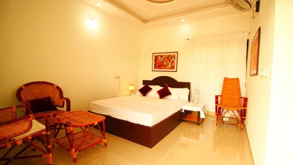 Image submitted for Kerala Backwater Homestay on its Kerala Tourism provider page; confirm current appearance and the exact room directly.
