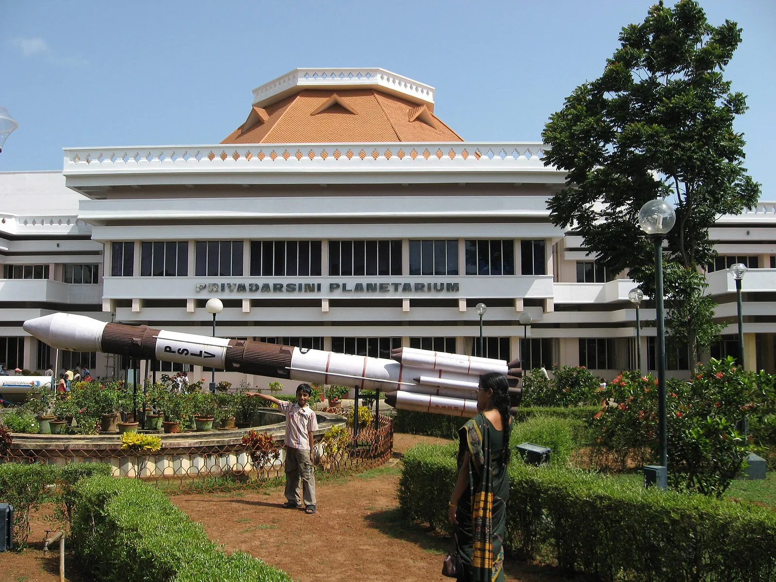 The Kerala Science and Technology Museum complex in Thiruvananthapuram with the planetarium dome behind the trees