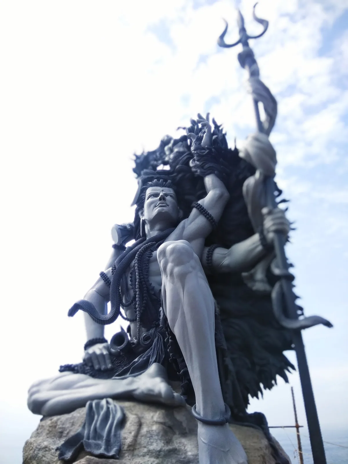 The Aazhimala Gangadhareshwara sculpture against the sky