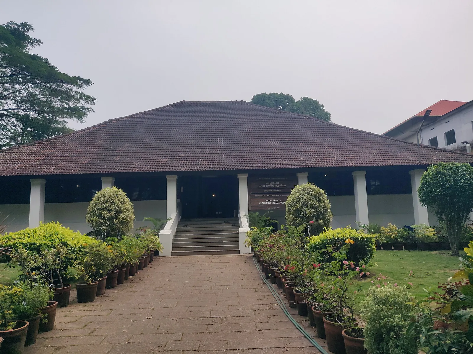 The Pazhassi Raja Archaeological Museum at East Hill, Kozhikode — the 1812 East Hill Bungalow with its Department of Archaeology signboard