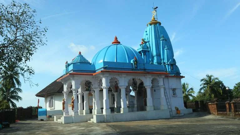 The blue domes and tower of the temple at Nithyananda Ashram in Kanhangad, a separate religious institution near Hosdurg Fort.